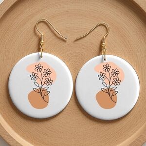 Elegant Floral Earrings in White and Orange